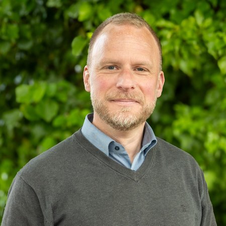 Porträtfoto von Dr. Wolfgang Dietze